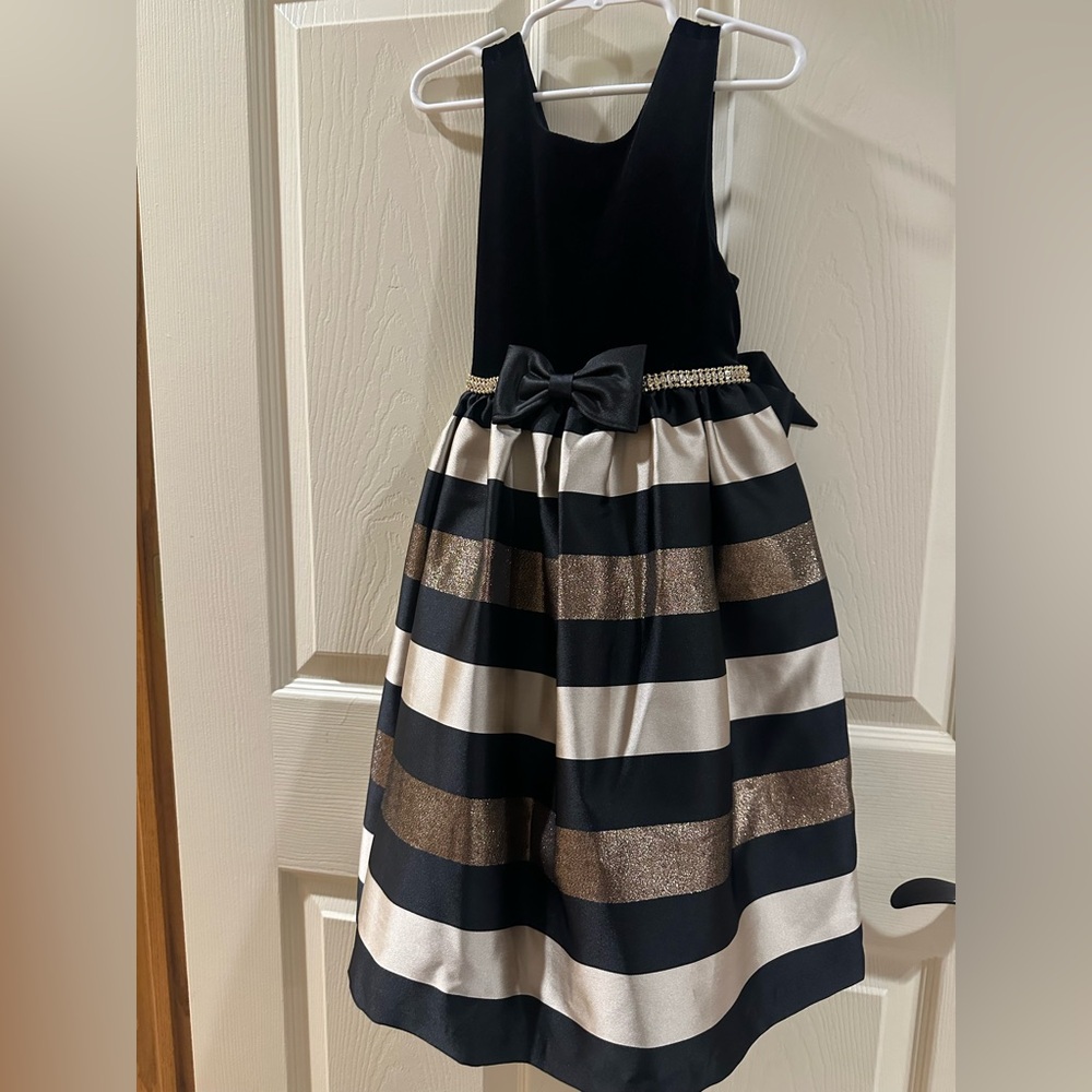 Elegant Black and Gold Striped Dress with Bow